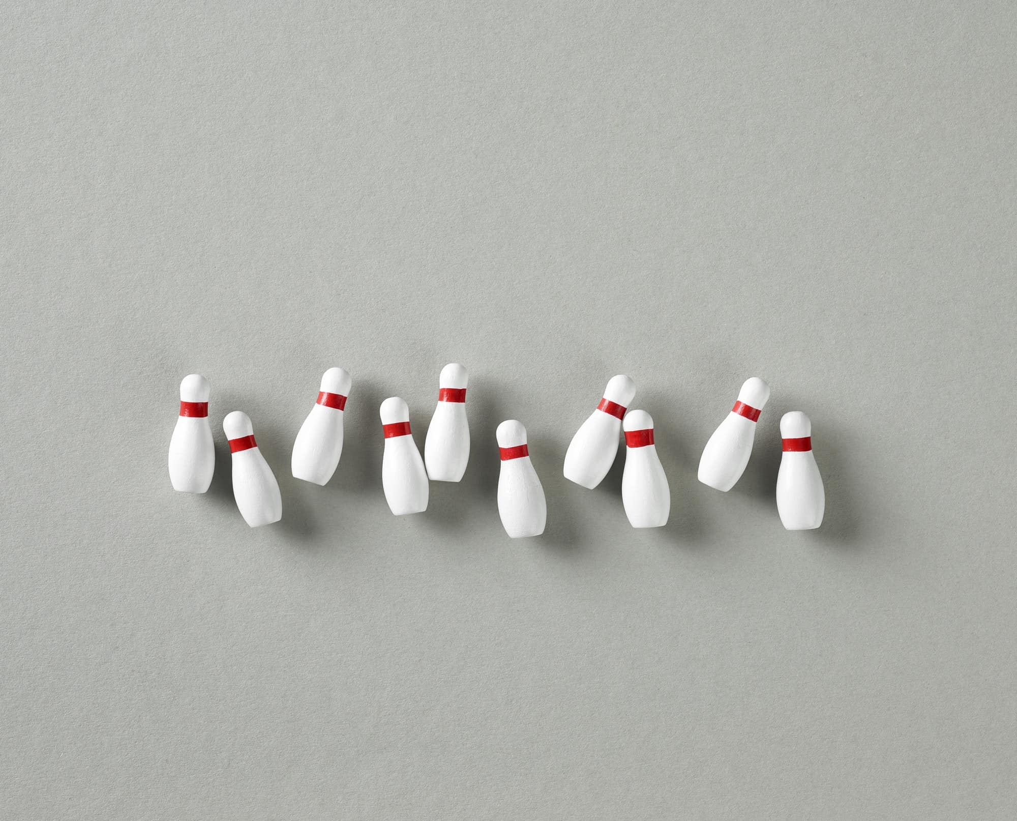 bowling pins on grey background