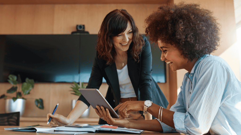 Chief Entertainment Officer engaging with a colleague, illustrating fluid leadership and evolving C-suite organizational roles.