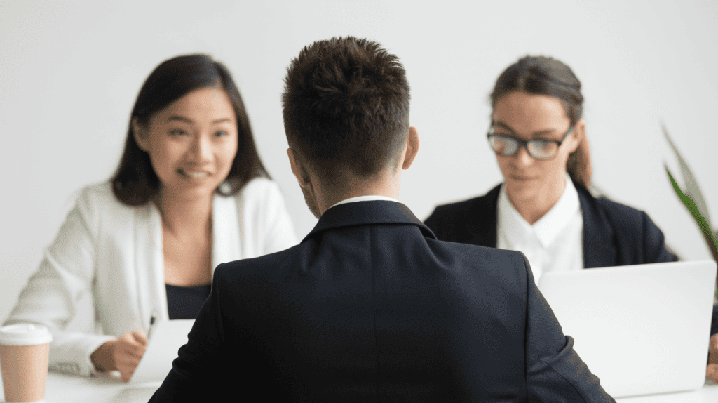 Executive candidate being assessed for leadership qualities and enterprise skills beyond resume credentials.