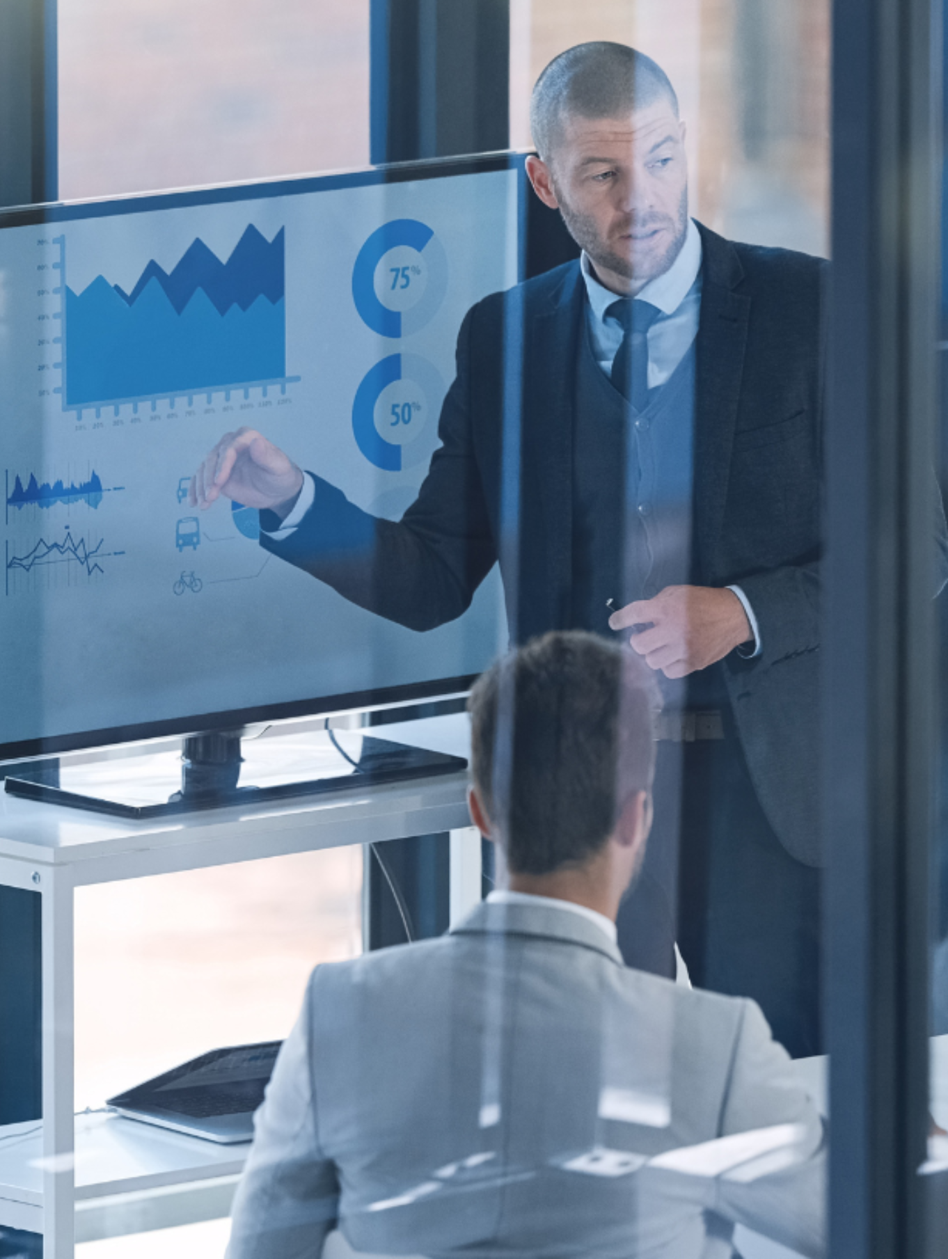 Chief Financial Officer presents financial reports to team.