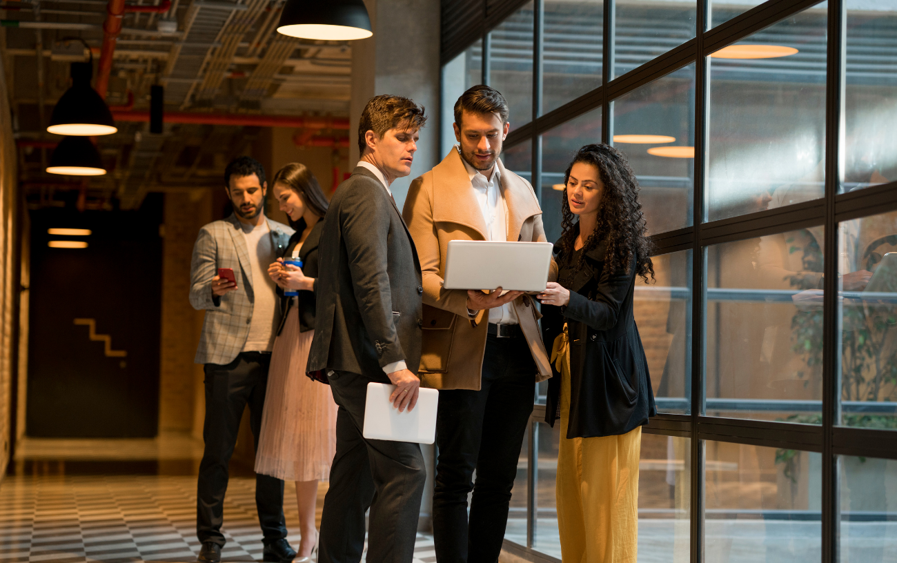 People and culture executives reviewing candidates and discussing hiring decisions, talent acquisition, and workforce strategy.
