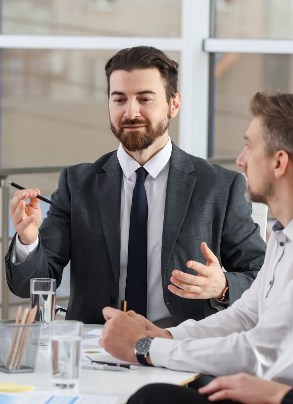 Chief Transformation Officer discussing strategy with the team during a meeting.
