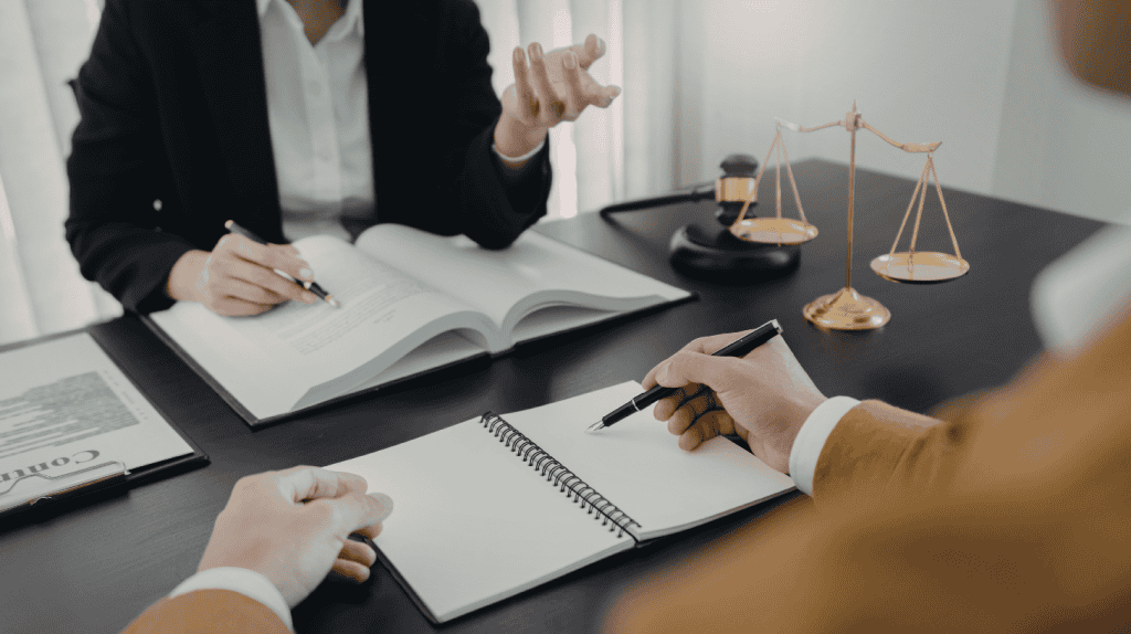 General counsel meets with another executive to provide legal guidance.